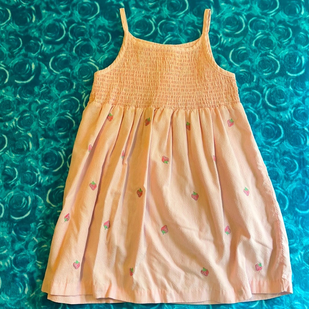 Pink sear sucker girls dress with strawberries